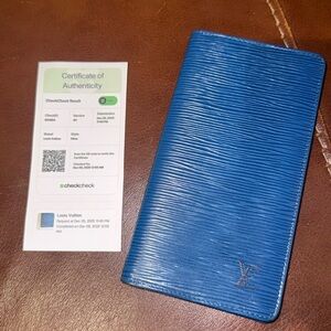 Good condition blue epi leather bifold wallet Louis Vuitton